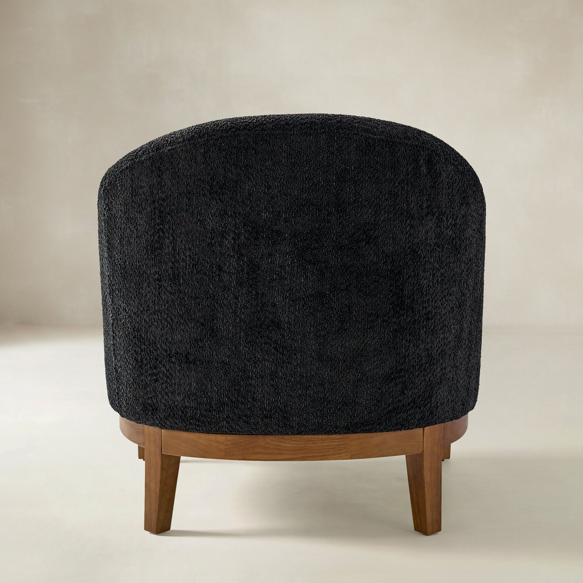 August Bouclé Moderner Sessel im Tonnendesign